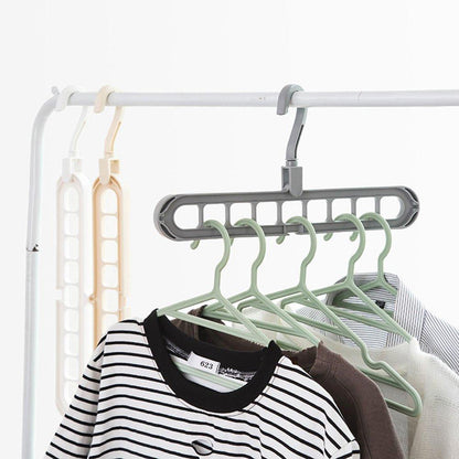9-Hole Plastic Hanger – Clothes Organizer for Wardrobe & Balcony (1 Pc)